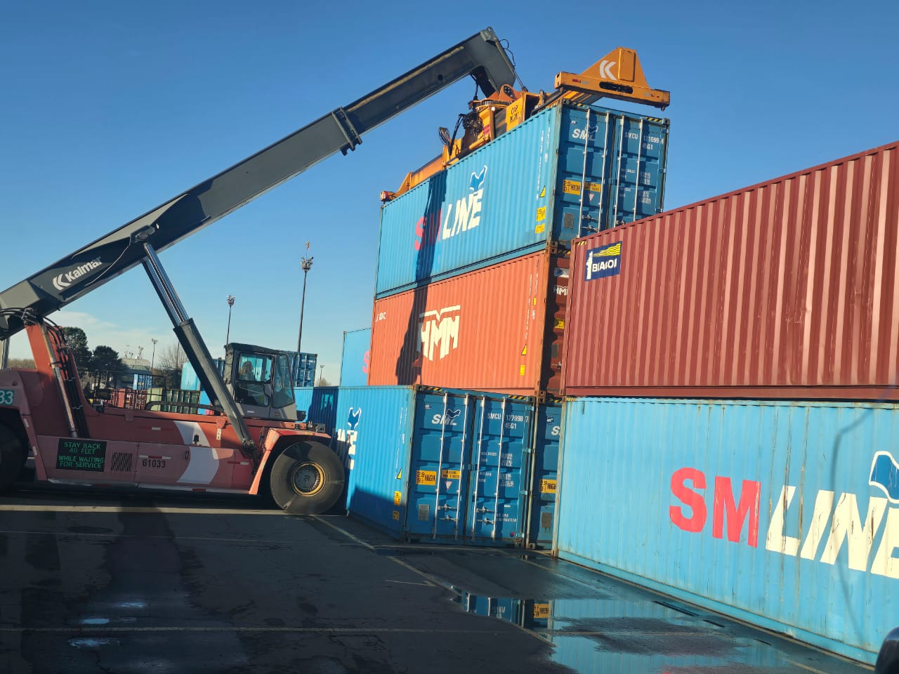 Container being moved from port